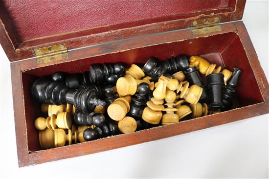 A Staunton carved wood chess set and a banded mahogany box Kings 9cm.